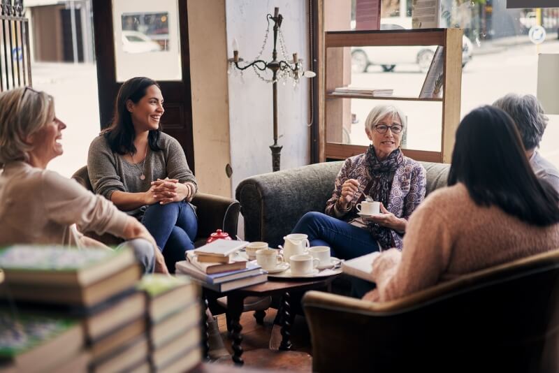 Women at a Coffee Shop Discussing